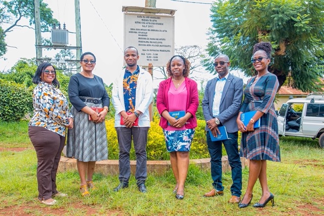 MSD Board of Trustees Member Dr. Ritah Mutagonda, in a Group Photo with Uru Kiseni Health Center Medical Director Dr. Emmanuel Makundi, along with other MSD leaders