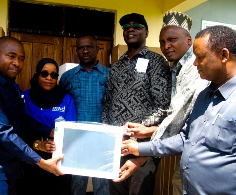Manyoni District Commissioner Hon. Vicent Mashinji Receiving Surgical Equipment Presented by the MSD Dodoma Zone Manager